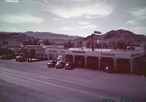 Film transparency of service station and cafe in Baker, California, circa 1940s