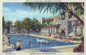 Postcard of the swimming pool at Furnace Creek Inn, Death Valley National Park, California, circa 1930s to 1950s