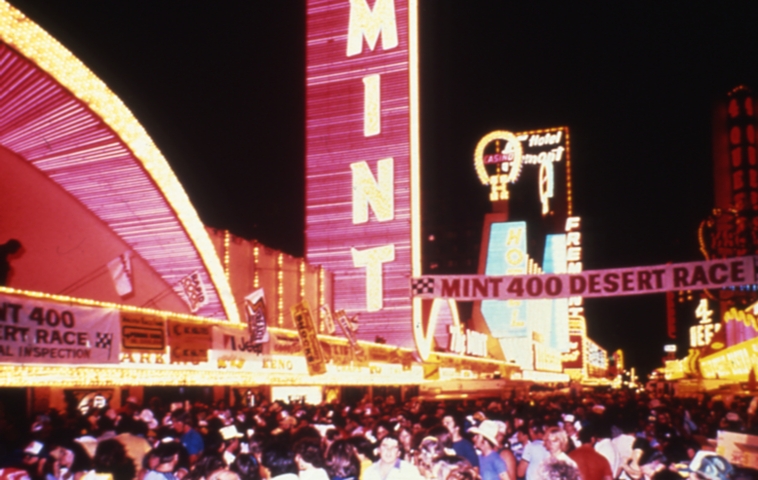 Slide of crowd in front of the Mint Hotel for the Mint 400 Desert Race, Las Vegas, circa 1980s