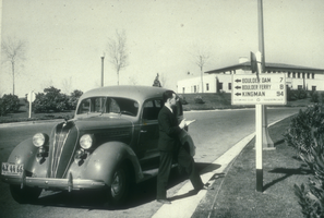 Slide of a man and a car in Government Park, Boulder City, Nevada, circa mid 1930s