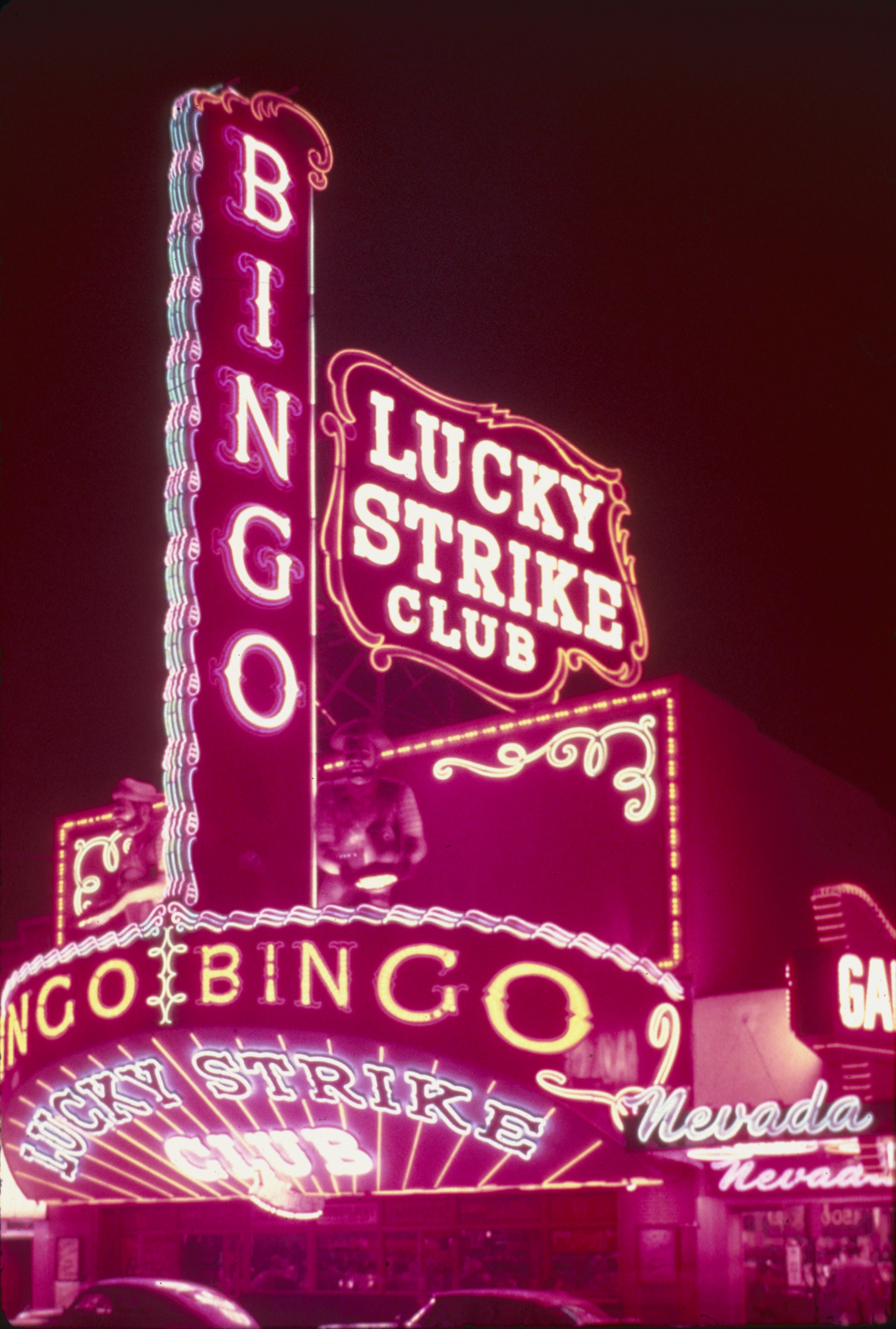 Slide of the neon signs for the Lucky Strike Club, Las Vegas, circa 1950s