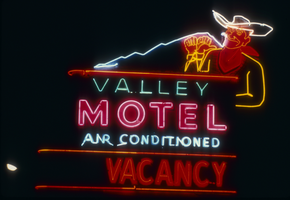 Slide of the neon sign for the  Valley Motel at night, Las Vegas, 1986