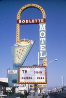 Slide of the neon sign for the Roulette Motel, Las Vegas, 1986