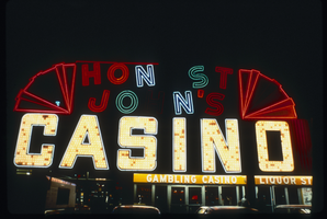 Slide of the neon sign for Honest John's Casino, Las Vegas, circa 1979