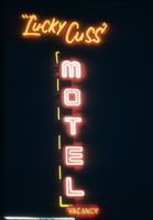Slide of the neon sign for Lucky Cuss Motel, Las Vegas, circa 1980s