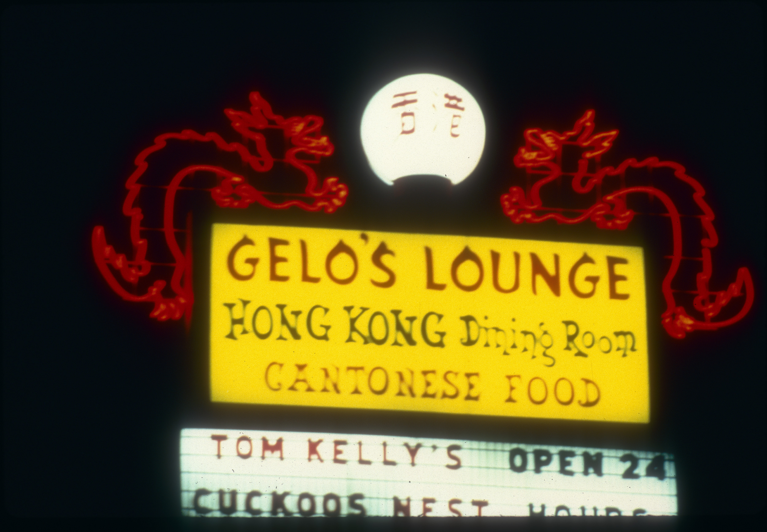 Slide of a neon sign for Gelo's Lounge, Las Vegas, circa 1980s