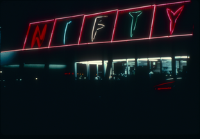 Slide of a neon sign for Nifty Market, Las Vegas, circa 1980s