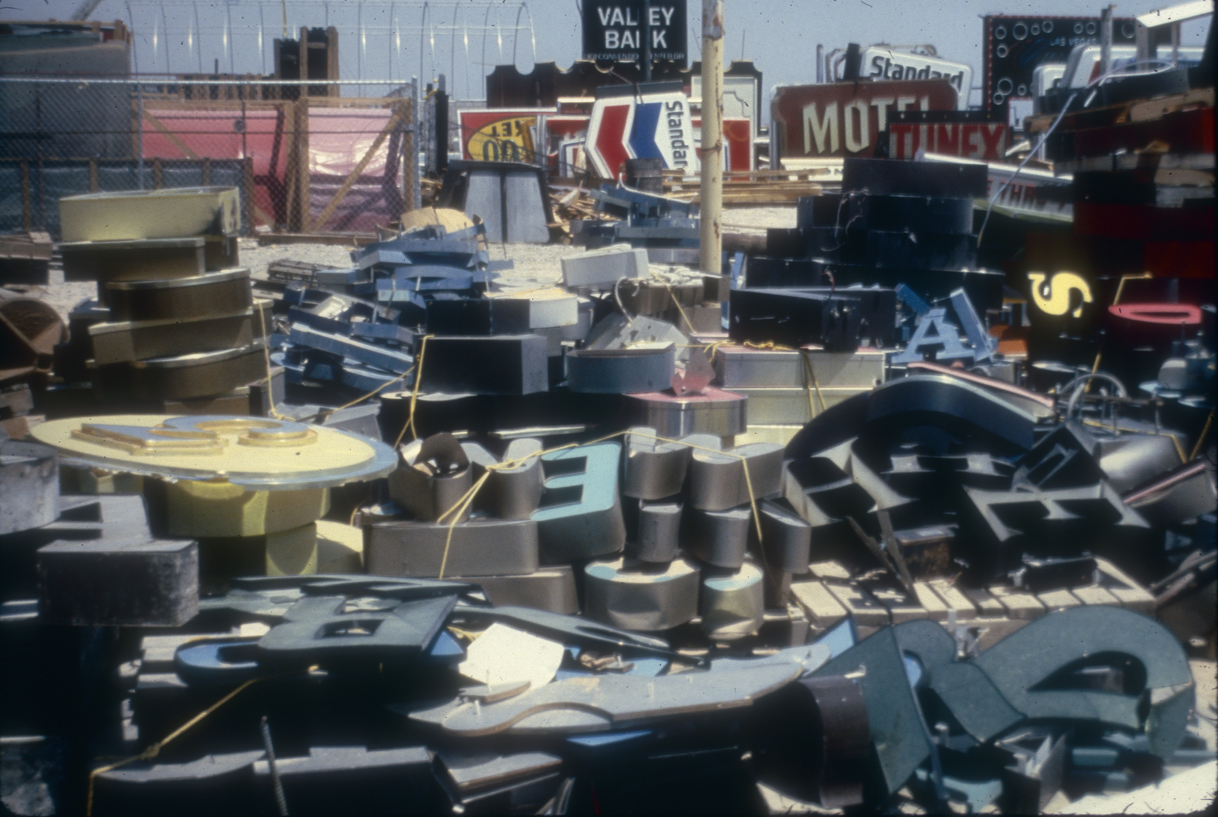 Slide of the Young Electric Sign Company (YESCO) sign graveyard, Las Vegas, 1986