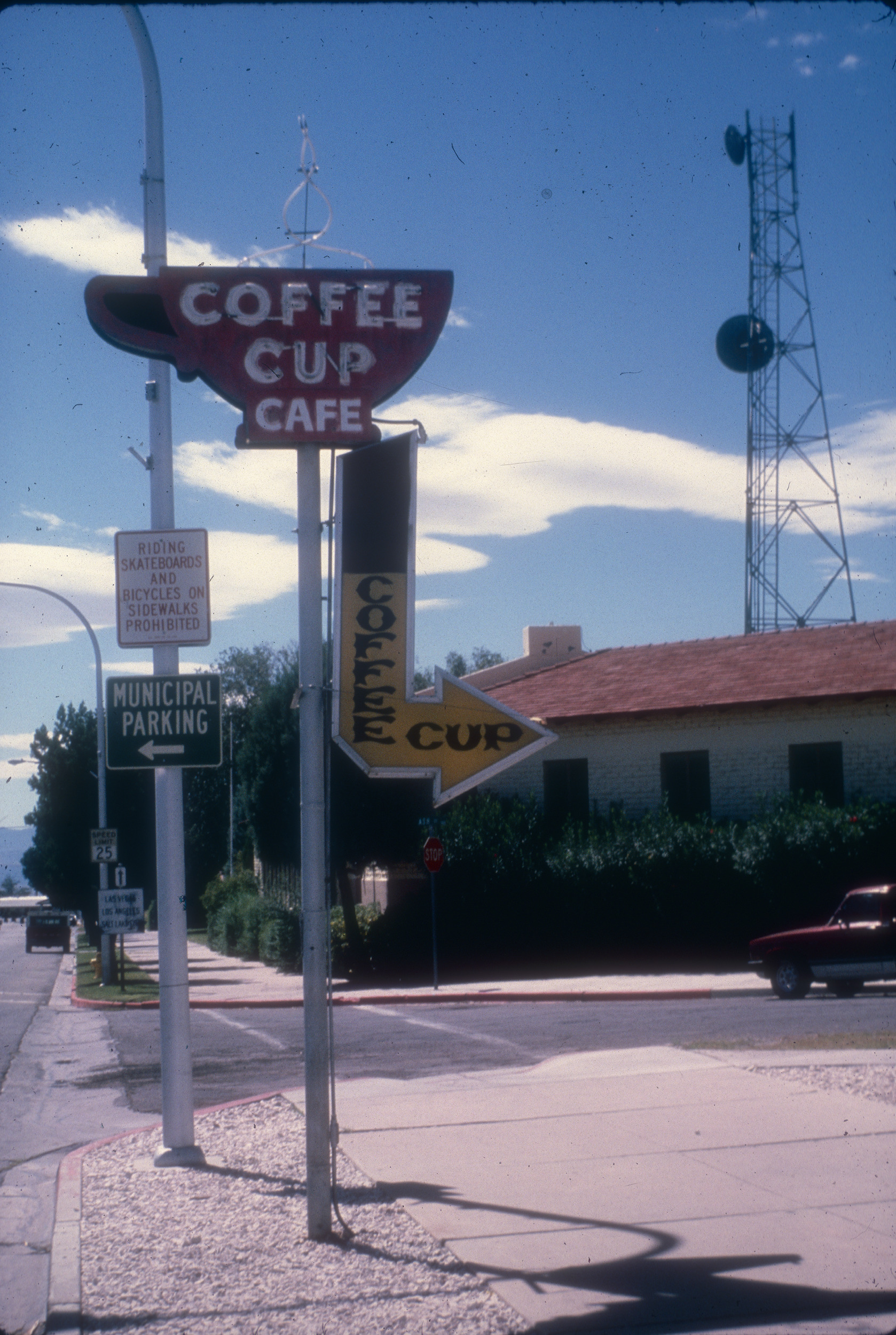 Slide of the neon signs for the Coffee Cup Cafe, Boulder City, Nevada, 1986