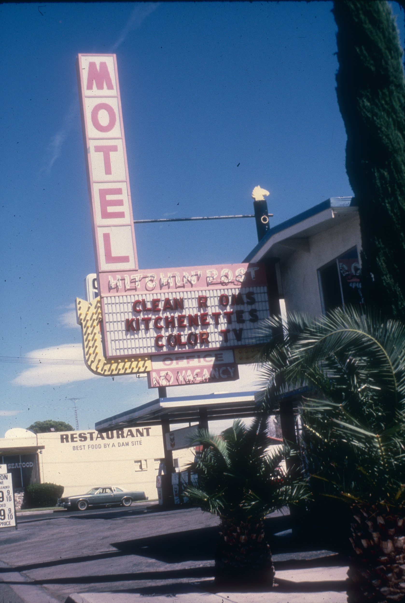 Slide of the neon sign for the Hitchin' Post Motel, Boulder City, Nevada, 1986