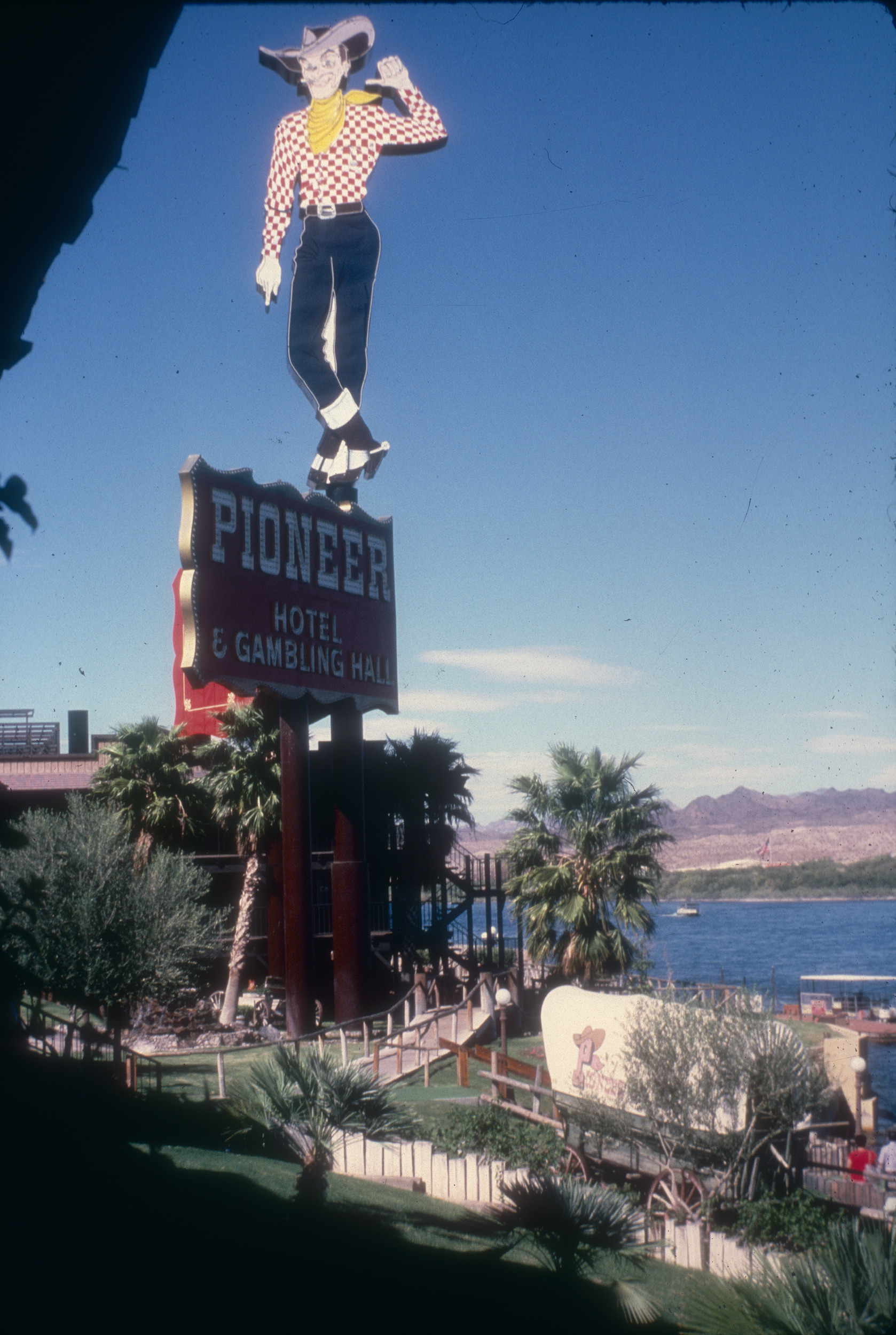 Slide of the cowboy neon sign at the Pioneer Hotel and Gambling Hall, Laughlin, Nevada, 1986
