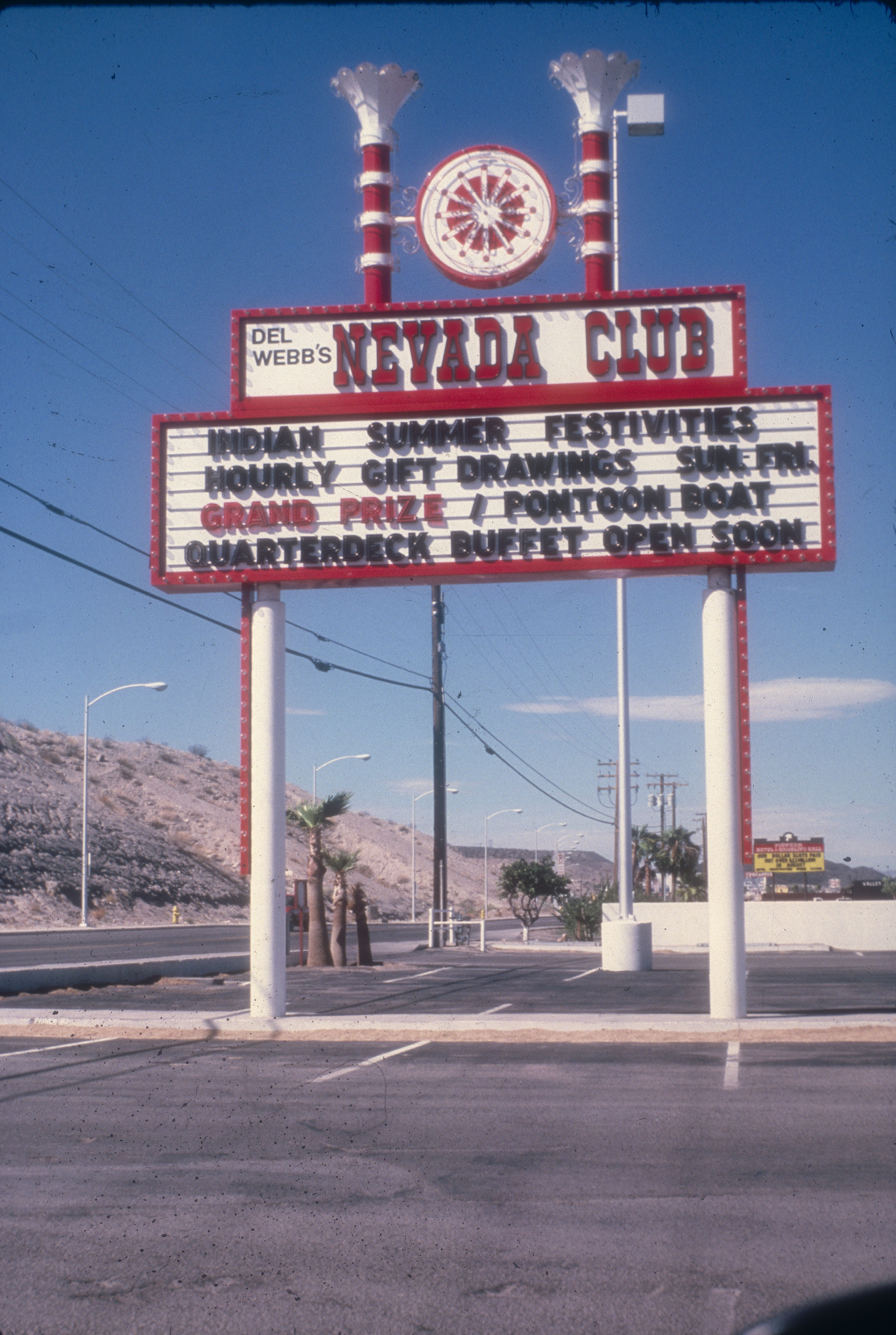 Slide of the neon sign for the Nevada Club, Laughlin, Nevada, 1986