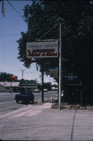Slide of the neon sign for the Covered Wagon Motel, Lovelock, Nevada, 1986