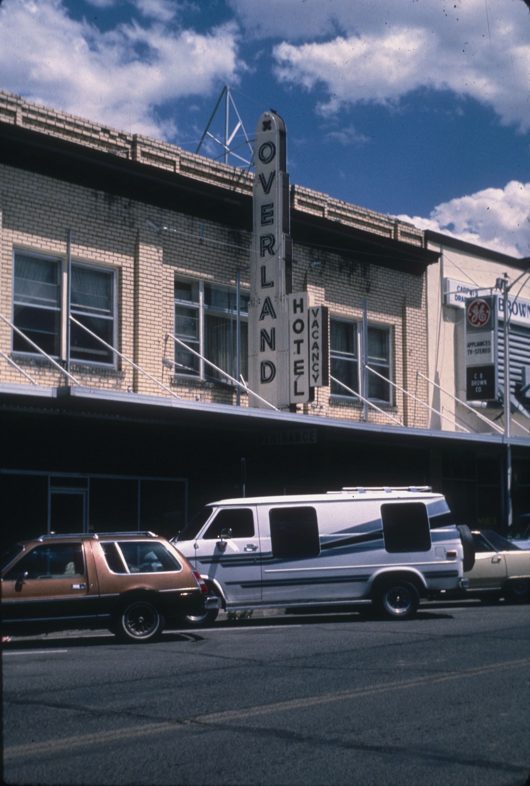Slide of the Overland Hotel and its neon signs, Winnemucca, Nevada, 1986