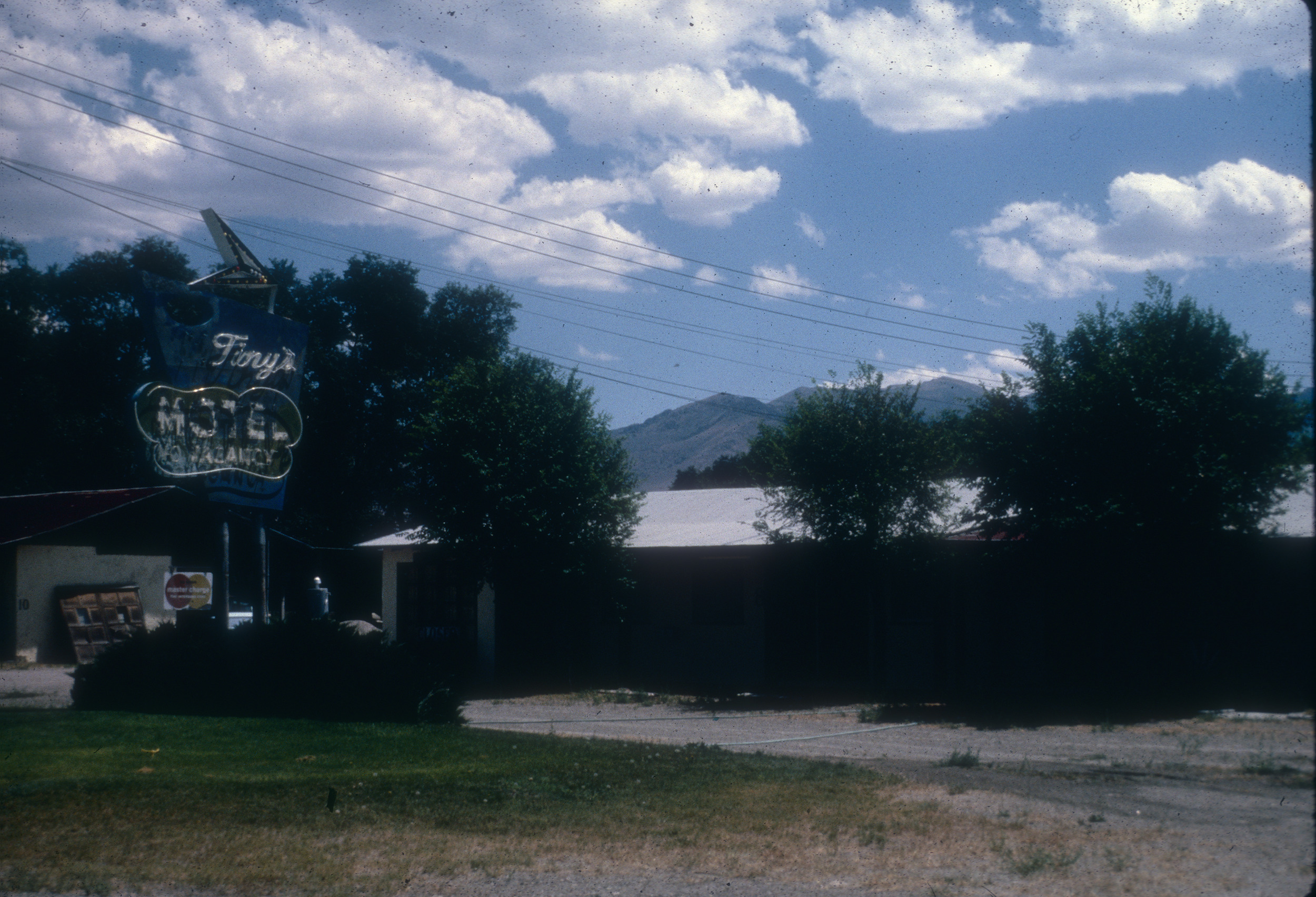 Slide of Tiny's Motel and its neon sign, Winnemucca, Nevada, 1986