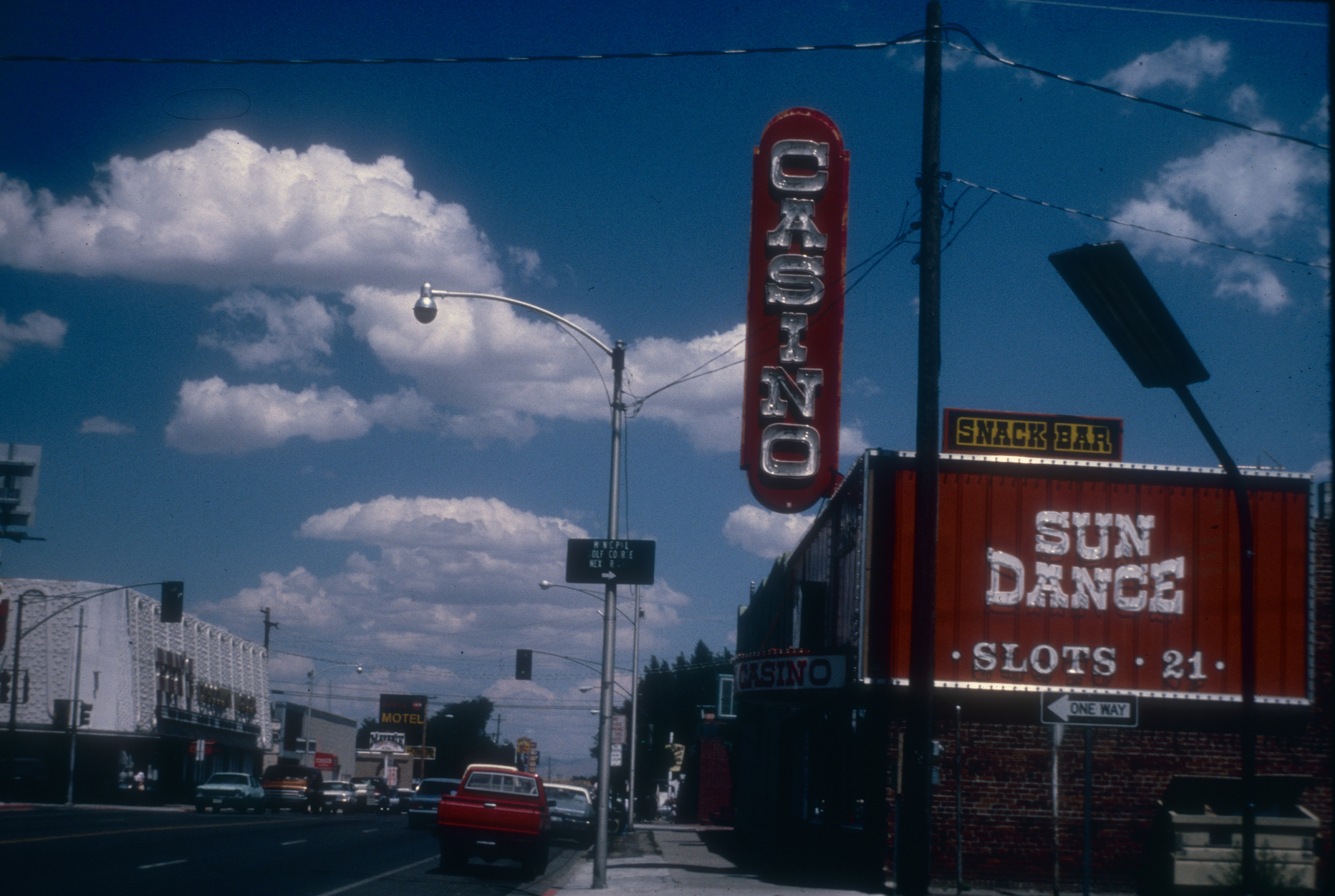 Slide of the Sundance Casino and its neon signs, Winnemucca, Nevada, 1986