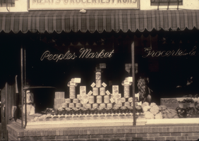 Slide of the neon sign in the window of People's Market, Elko, Nevada, circa 1928