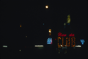 Slide of neon signs for Nevada Club, Ely, Nevada, 1986