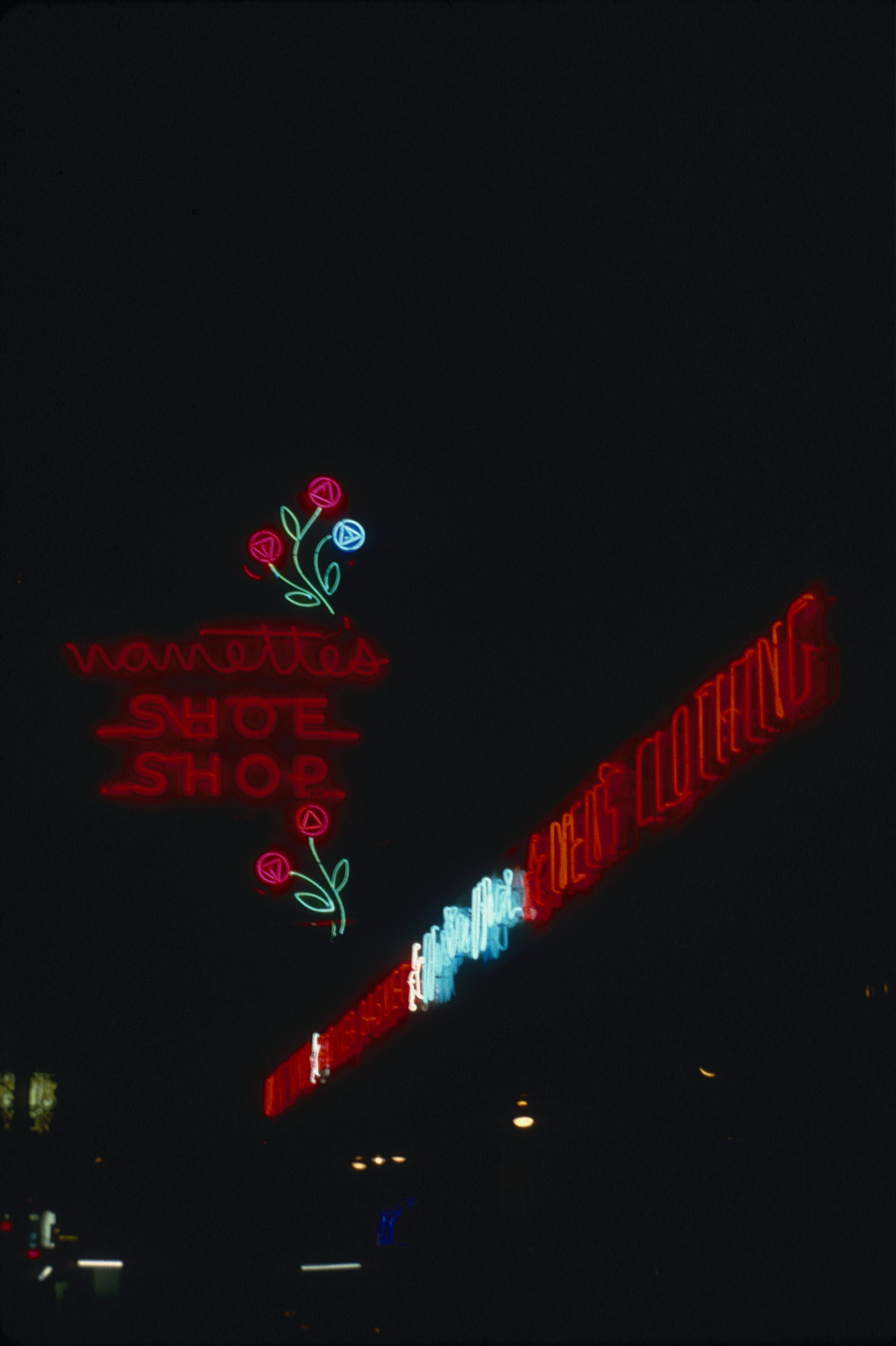 Slide of neon sign for Nanette's Shoe Shop, Ely, Nevada, 1986