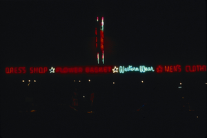 Slide of neon signs for Nanette's Shoe Shop, Ely, Nevada, 1986