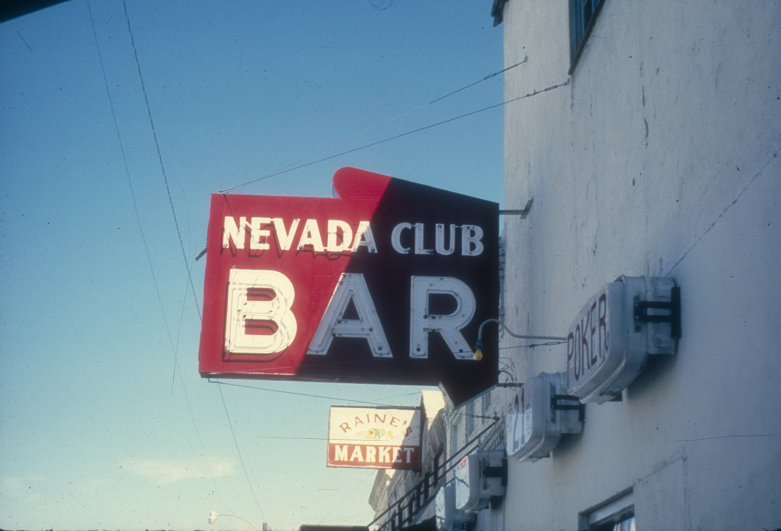 Slide of the Nevada Club Bar sign, Eureka, Nevada, 1986