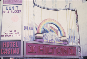 Slide of neon signs for the Hilton Hotel, Reno, Nevada, 1986