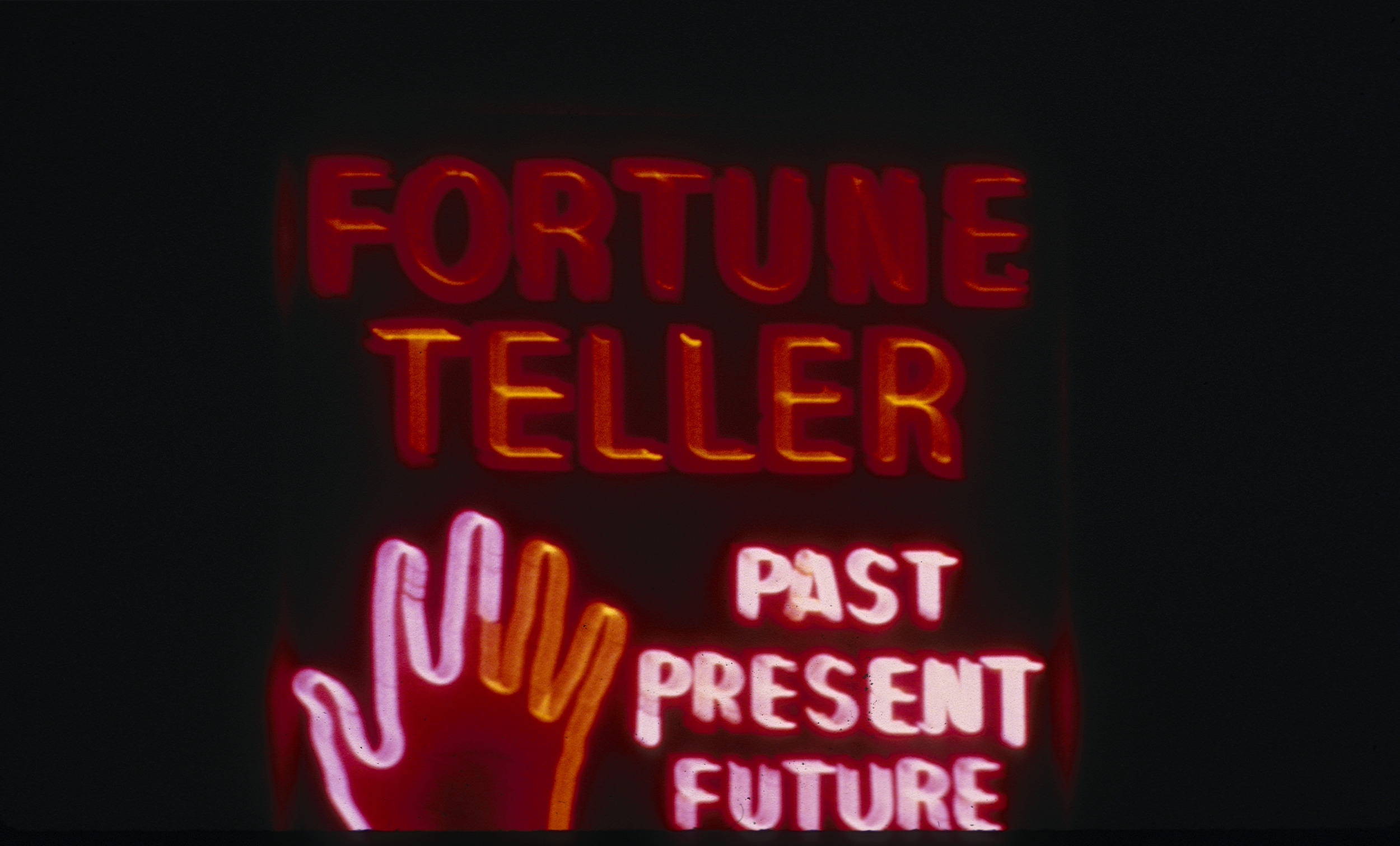 Slide of a neon sign for a fortune teller, Reno, Nevada, 1986
