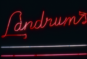 Slide of the neon sign for Landrum's Cafe, Reno, Nevada, 1986
