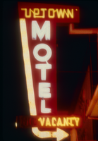 Slide of the neon sign for the Uptown Motel, Reno, Nevada, 1986