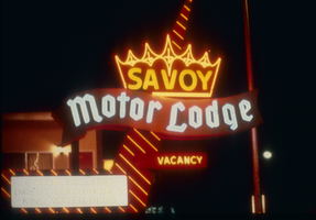 Slide of the neon sign for the Savoy Motor Lodge, Reno, Nevada, 1986