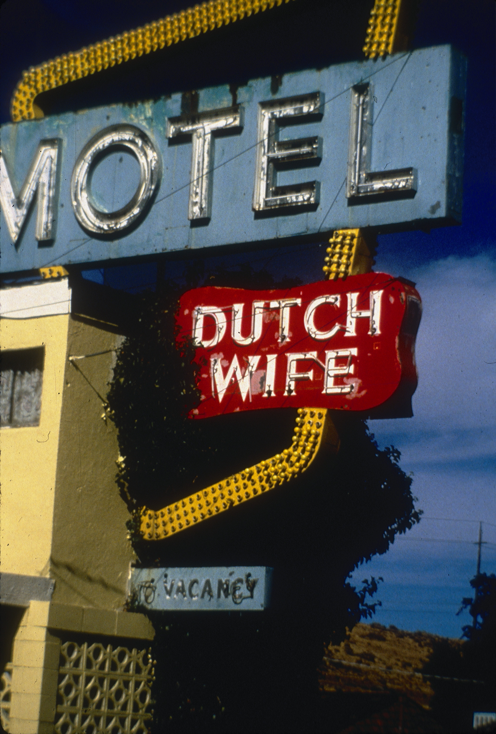 Slide of the neon sign for the Dutch Wife Motel, Reno, Nevada, 1986