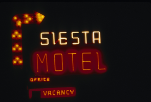 Slide of the neon sign for the Siesta Motel at night, Reno, Nevada, 1986