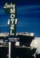 Slide of the neon sign for the Lucky Motel, Reno, Nevada, 1986