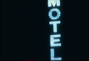 Slide of a portion of the neon sign for the Lucky Motel, Reno, Nevada, 1986