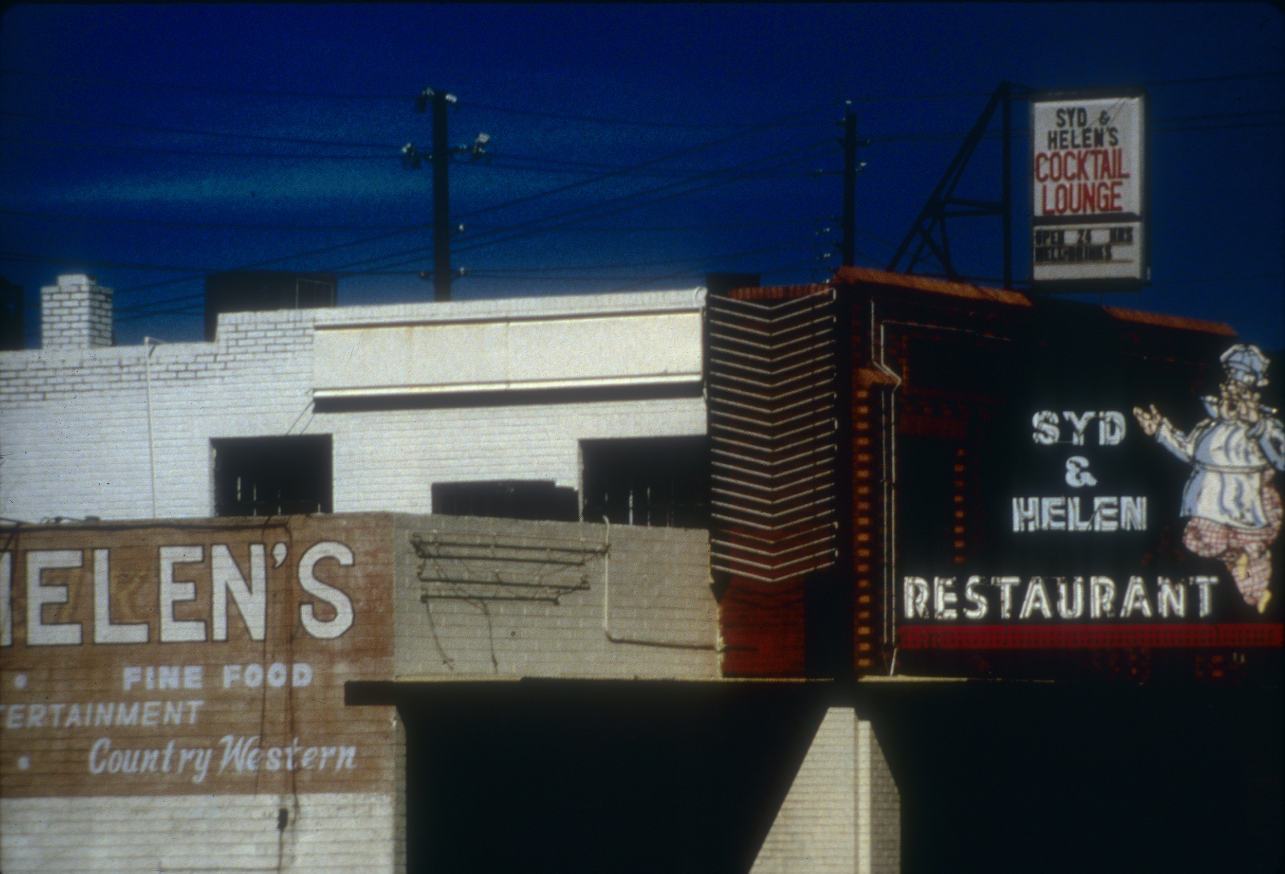 Slide of the neon sign for Syd and Helen's Cocktail Lounge and Restaurant, Reno, Nevada, 1986