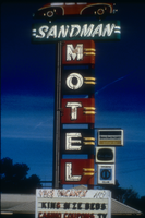 Slide of the neon sign for the Sandman Motel, Reno, Nevada, 1986