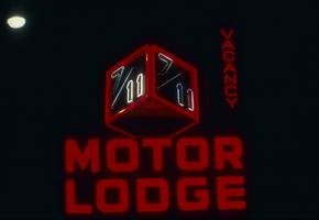 Slide of the neon sign for the 7/11 Motor Lodge at night, Reno, Nevada, 1986