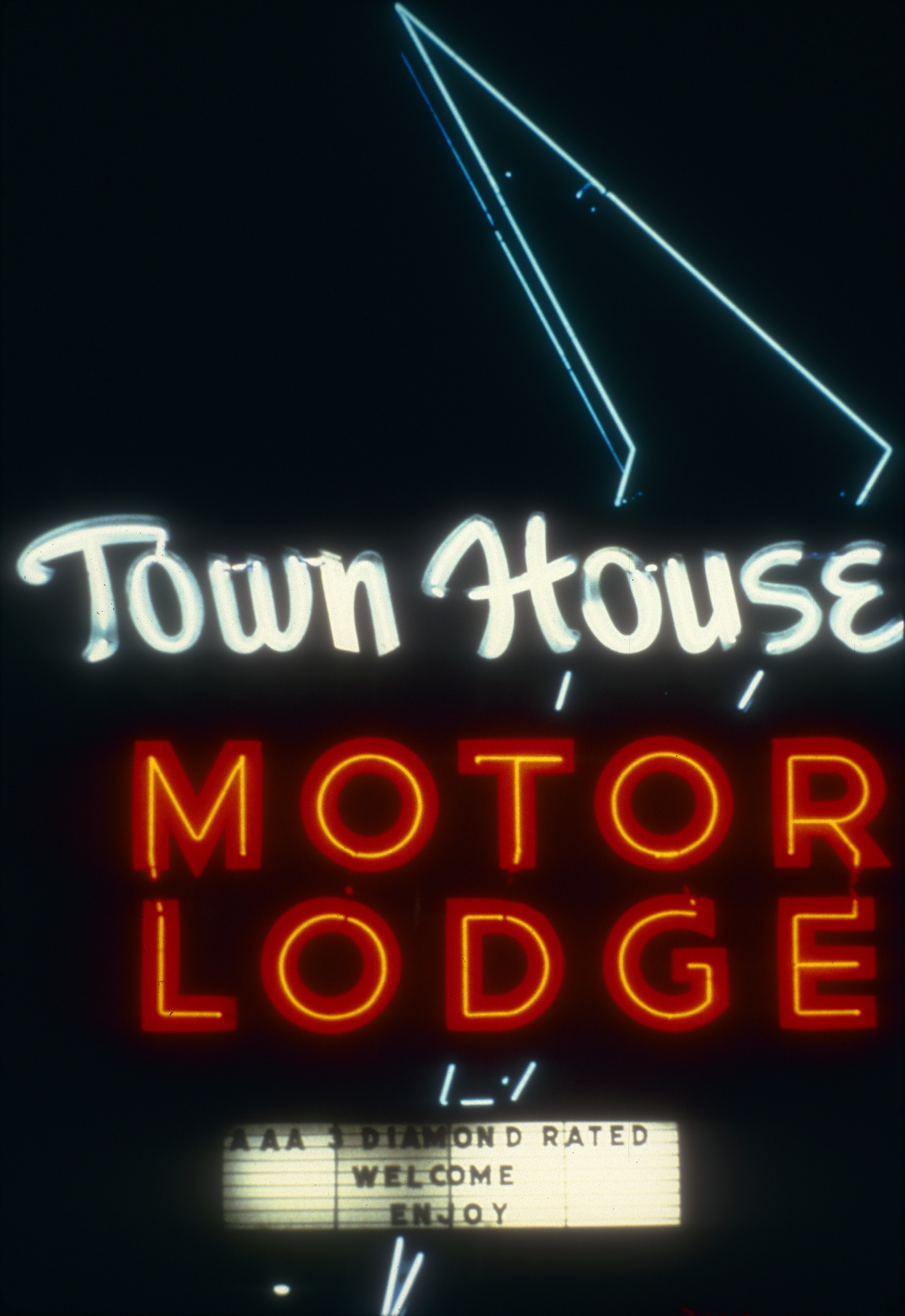 Slide of the neon sign for the Town House Motor Lodge at night, Reno, Nevada, 1986