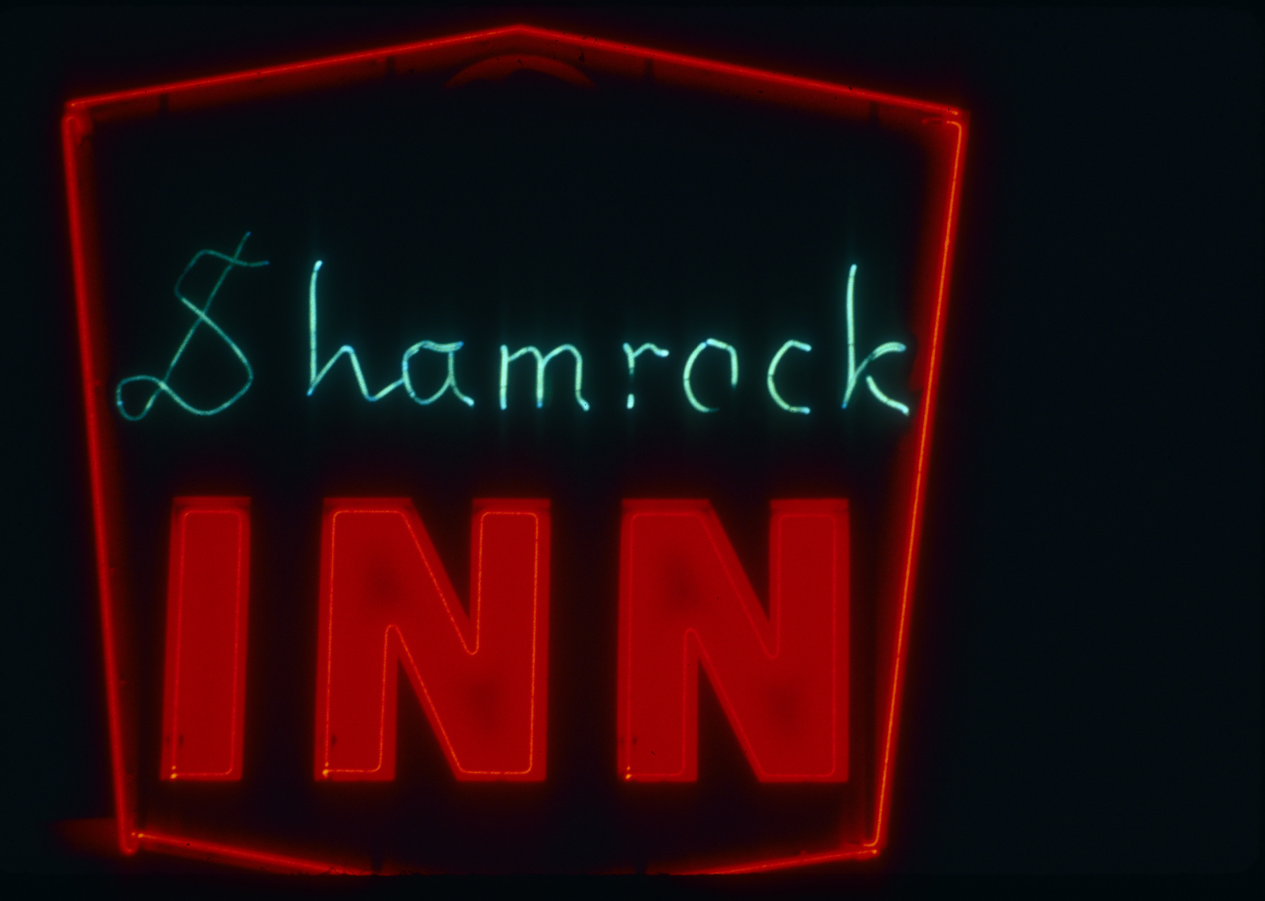 Slide of the neon sign for the Shamrock Inn, Reno, Nevada, 1986