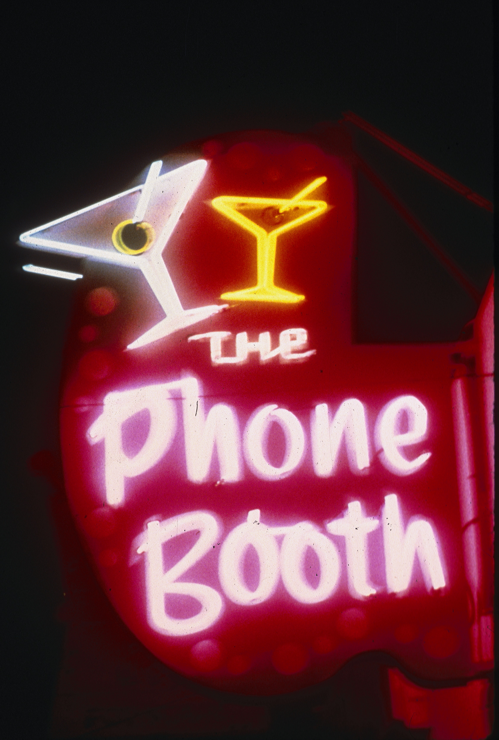 Slide of the neon sign for the Photo Booth Bar, Reno, Nevada, 1986