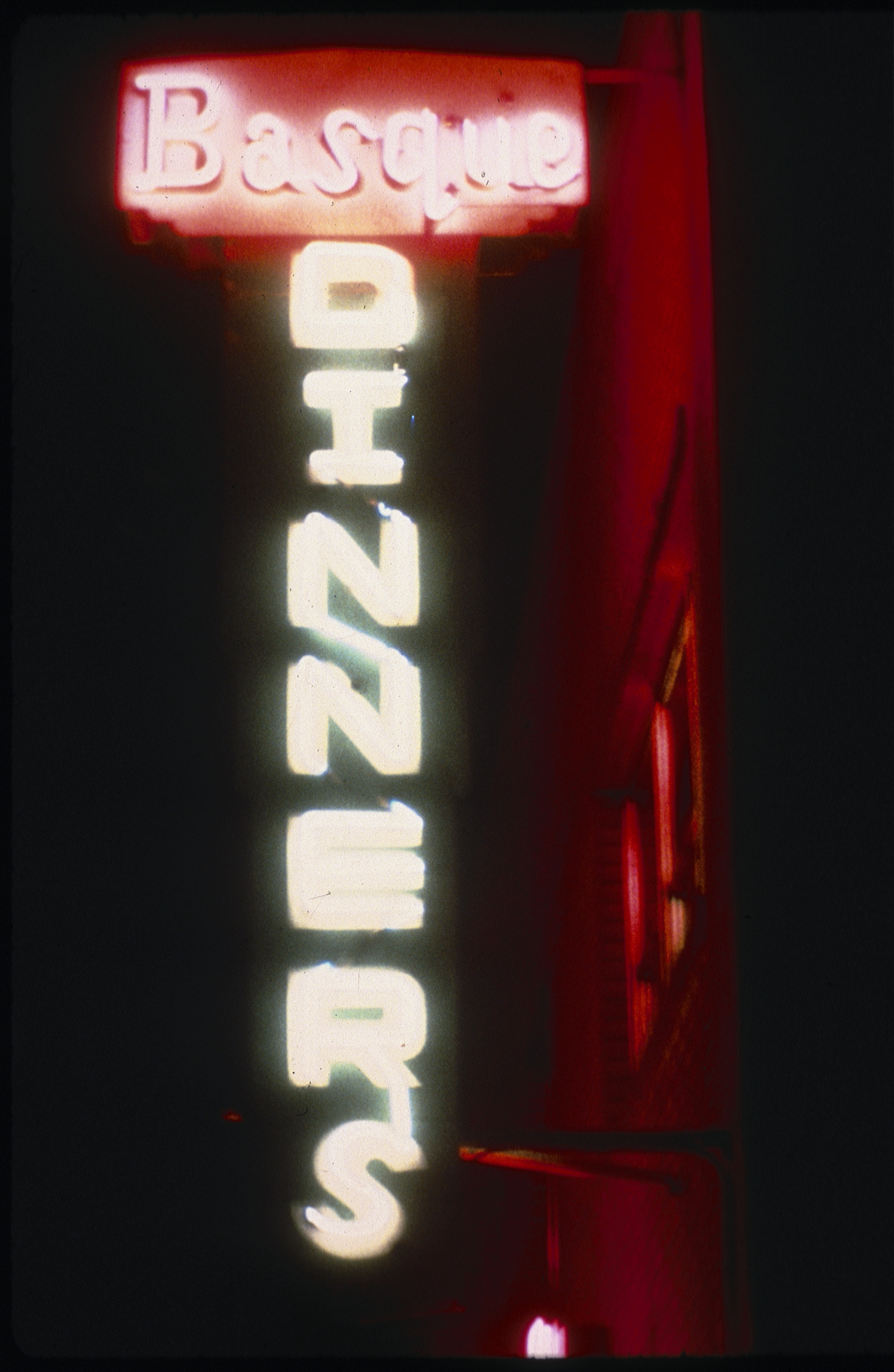 Slide of the Basque Dinners neon sign for the Santa Fe Hotel, Reno, Nevada, 1986
