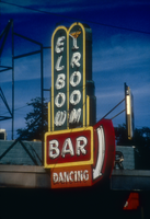 Slide of the neon sign for the Elbow Room Bar, Reno, Nevada, 1986