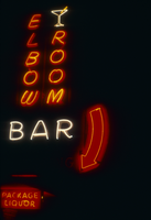 Slide of the neon sign for the Elbow Room Bar at night, Reno, Nevada, 1986