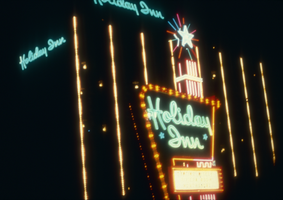 Slide of the Holiday Inn and its neon signs, Nevada, 1986