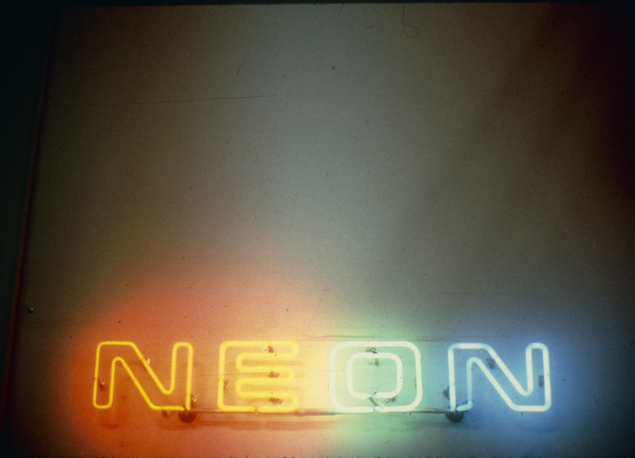 Slide of the neon sign over YESCO's neon bending room, Nevada, 1986
