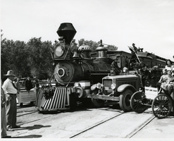 Photograph of a former Virginia and Truckee locomotive on a publicity tour for the film, Union Pacific, Nevada, 1939