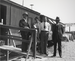 Photograph of W. R. Armstrong, Mr. and Mrs. D. E. Shelley, and N. E. McKinnon, Boulder City, Nevada, circa 1931