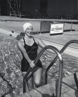Photograph of Florench Chadwick climbing out of the pool at the Last Frontier Hotel, Las Vegas, circa 1950s