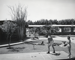 Photograph of guests playing shuffleboard at the Desert Lodge, possibly Nevada, circa 1940s to 1950s