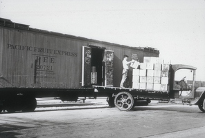 Slide of a worker unloading a refrigerator car, Las Vegas, 1935